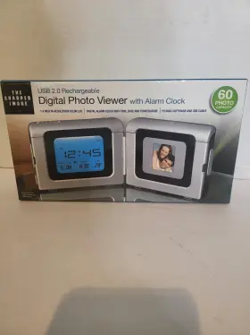1618463 The Sharper Image Digital Photo Viewer With Alarm Clock Time Date Temperature