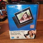 New Coby 3.5" Portable Digital Photo Album DP-350 1GB Speakers Plays MP3 Files. Fixed Price $15.80.
