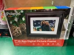 Polaroid PDF-750W 7-INCH High-res Digital Photo Frame Black Wood (E10031281). Fixed Price $24.95.