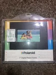 Polaroid CPA-00711S 7" Digital Picture Frame. Fixed Price $24.99.