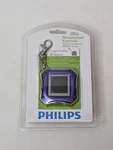 Vintage Y2K Philips 1.5 Digital Photo Keychain & Clock Purple Nos Sealed. Fixed Price $14.95.
