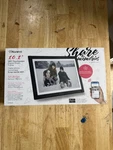 Aluratek Wifi Touchscreen Digital Photo Frame. Fixed Price $80.00.