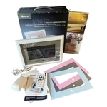 Memorex 7" Widescreen Digital Photo Frame White MDF0712C With Remote And Inserts. Fixed Price $25.87.