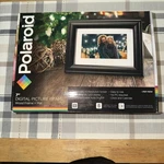 Polaroid 7" Digital Picture Frame Wood + Mat (PDF-750W). Fixed Price $15.00.