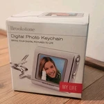 Brookstone Digital Photo Key-chain 1.5 Lcd Ring. Fixed Price $9.99.