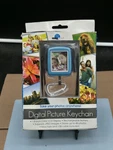 Digital Picture Keychain 1.8 Color Lcd Display Rechargeable. Fixed Price $9.00.