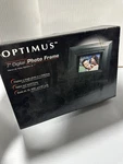 7" Optimus 16-468 16MB 480X234 Widescreen Digital Wood Photo Frame (black). Fixed Price $45.00.