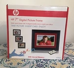 Hp DF780B2 7" Black Wood Digital Picture Frame 2GB Memory. Fixed Price $28.00.
