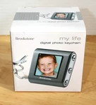 Brookstone Digital Keychain 1.5" Stores 100 Photos Rechargeable New. Fixed Price $9.99.