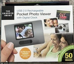 The Sharper Image Pocket Photo Viewer Usb 2.0 Rechargeable With Digital Clock. Fixed Price $9.99.