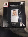 Nextgen Digital Photo Key Chain. Fixed Price $25.99.