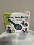 Digital Concepts Keychain Photo Frame 1.1" Display Holds 180 Images. Fixed Price $12.00.