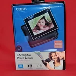 Coby Dp 350 Digital Album 1GB 1000 Photos 2008. Fixed Price $49.95.