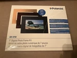 Polaroid 7" Digital Photo Kit Bonus Includes 3 Designer Frames XSA-00750B. Fixed Price $20.30.