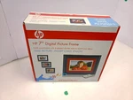 Hp DF780B2 7" Black Wood Digital Picture Frame 2GB Memory W/ Remote - Open Box. Fixed Price $40.00.