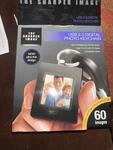 The Sharper Digital Photo Album Keychain Usb 2.0 Rechargeable 60 Images. Fixed Price $30.00.
