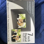 Starlight 7 Digital Photo Frame Tft Lcd 16-9 Jpeg, Sd, Xd, Mmc, Remote Control. Fixed Price $30.00.