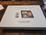 Zcyge Digital Photo Frame 10.1 Inch, Electronic Picture Wifi With App. Fixed Price $50.00.