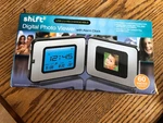 New Shift 3 Digital Photo Viewer With Alarm Clock - Usb 2.0 Rechargeable. Fixed Price $10.00.