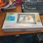 Coby DP700 - 7" Widescreen Digital Photo Black Frame. Fixed Price $15.00.