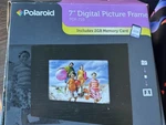 Polaroid PDF-710 7" Digital Picture Frame Black 2GB Memory Sd Compatible. Fixed Price $25.99.