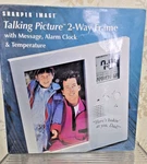 Sharper Image 2 Way Talking Frame W/ Message, Alarm Clock & Temperature Sealed. Fixed Price $15.00.
