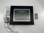 Brookstone 10" X 12.5" Digital Picture Frame Black AH1812-B. Fixed Price $21.50.