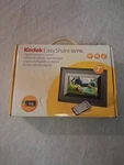 Kodak Easyshare SV710 7" Digital Picture Frame With Remote Box And All Papers. Fixed Price $9.99.
