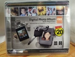 Innovage Digital Photo Album Key Chain 8MB/USB. Fixed Price $13.00.