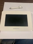 Samsung SPF-71ES Digital Photo Frame 7" Inch Wide Black 1GB Built Memory. Fixed Price $28.03.