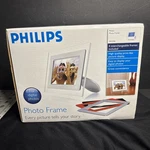 Philips Clear Photo Frame 7FF1M4 7" Digital Picture Interchangeable Color. Fixed Price $38.00.