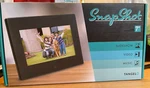 Tangelo Snapshot 7" Digital Photo Frame- Slideshow W/ Music-clock Calendar. Fixed Price $14.97.