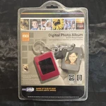 Innovage Digital Keychain 8MB 60 Color Photos 1.4" Lcd Screen(pink). Fixed Price $14.99.