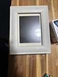 Digital Photo Frame 10.1 Inch. Fixed Price $27.99.
