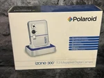 Polaroid Izone 300 3411 3.2MP 1.5" Lcd Screen Slim Digital Camera (for Parts). Fixed Price $18.99.