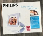 Philips 7" Digital Photo Display Slideshow Frame 7FF1AW/37 White. Fixed Price $20.00.