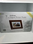 Giinii 7-INCH Artforme Digital Wood Frame 1000 Pictures GN-705W Nib. Fixed Price $14.95.