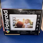 Polaroid 7" Digital Picture Silver Textured Frame Hi-resolution Led Screen. Fixed Price $13.00.