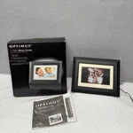 Optimus 7" Digital Photo Frame With Power Cord Display Size. Fixed Price $10.96.