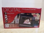 Digital Frame 9" X 6.5" SP70BRS Black Wood. Fixed Price $22.95.