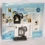 Digital Album, Innovage 8MB/USB Rechargable W Keychain Holds 60 Photos. Fixed Price $5.00.