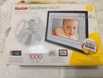 Kodak Easy Share M820 Holds 1000 Photos Videos Music 8" Screen New. Fixed Price $12.00.
