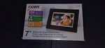 Coby 7" Widescreen Digital Photo Frame DP700WD Lcd Display (C8). Fixed Price $15.99.