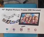 Fotomoon 10" Digital Photo Frame Hd, Remote, Music Video Picture. Fixed Price $28.99.
