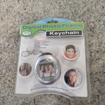 Digital Photo Frame Keychain Sakar Holds Up 107 Images 2009 Sealed New. Fixed Price $12.00.