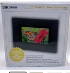 Curtis Digital Photo Frame DPF711; JPEG,MP3, Remote, Ac Adaptor, Av Cord. Fixed Price $17.95.
