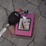 Sharper Image 1.4''DIGITAL Photo Album. Fixed Price $9.00.