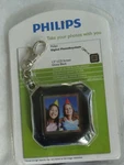 New Open Package Philips 1.5 Inch Digital Photokeychain Black, Chrome. Fixed Price $13.99.