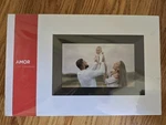Amor Digital Photo Frame 10.1 Inch Wifi Anywhere. Fixed Price $29.00.