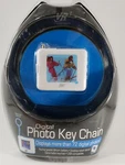 VR3 Digital Key Chain Holds 72 Photos Rechargeable Desktop Easel Stand. Fixed Price $14.99.